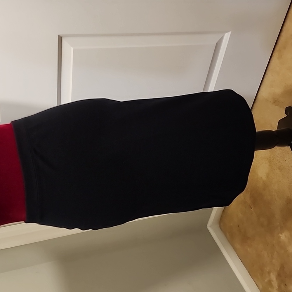 Womens One Step Up Black Pencil skirt Size Large with side slit. Mid knee length